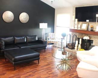 BUY IT NOW!  $975.00.                                                                           West End/Williams Sonoma Black Leather                        sofa w/41" sq. ottoman. 97" L x 39 1/2" W.