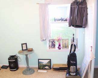 This room is full of craft items, practical cleaning items, horse riding gear, linens and more.