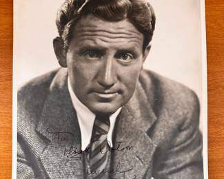 Spencer Tracy autographed studio still.  Metro Goldwyn Mayer stamp on reverse