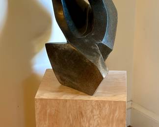 "The Listener" stone sculpture and base.