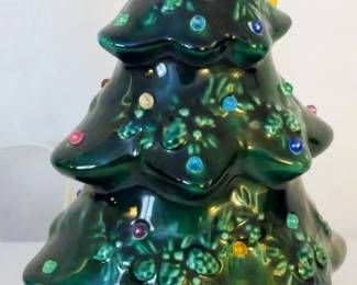 1177 - Vintage Lighted Ceramic Christmas Tree 8" You are buying a used as-is electric/electronic item. We do not guarantee all components are present, and if it is not expressly stated, it is untested.
