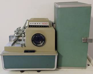1139 - Argus 500 Projector with Slides You are buying a used as-is electric/electronic item. We do not guarantee all components are present, and if it is not expressly stated, it is untested.
