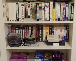 1121 - 3-Shelf Lot of VHS Tapes and More
