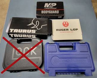157 - Assorted Gun Boxes/Cases glock case not included
