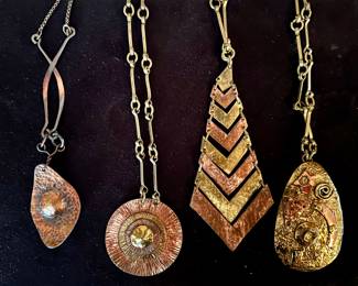 Brutalist necklaces, including Pericles of Haiti