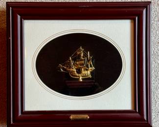 Santa Maria framed gold tone model ship
