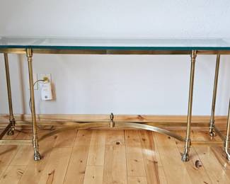 Brass framed sofa table with a glass top