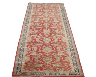 RED LEAF PATTERN RUNNER (2 Of 2) | An antique style corridor rug with scrolling floral pattern on a red ground within a blue border. - w. 47 x l. 221 in