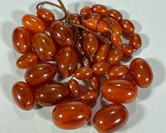 Loose Amber Beads | Of varying sizes, for jewelry making. -  l. 1 in (largest, approx.)