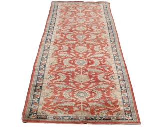 RED LEAF PATTERN RUNNER (1 Of 2) | An antique style corridor rug with scrolling floral pattern on a red ground within a blue border. - w. 47 x l. 221 in
