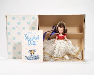 NANCY ANN STORYBOOK DOLL | "A Very Independent Lady for July" #193 from the Dolls of the Month series by Nancy Ann Story Book Dolls. In original box with tag still on wrist. Doll height: 7in. - h. 3.5 x w. 8.75 x l. 8.75 in (Box)