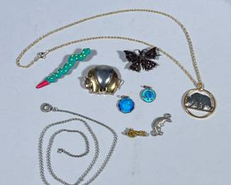 MIXED COSTUME JEWELRY | Including gold tone necklace with bear pendant, elephant pin, butterfly pin, and more! -  l. 18 in (good tone chain)