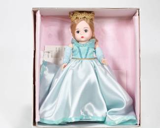 MADAME ALEXANDER "SLEEPING BEAUTY" DOLL | Ceramic "Sleeping Beauty" doll from Madame Alexander in original box with all original paperwork. Doll height: 8in - h. 3.5 x w. 8 x l. 8.5 in (Box)