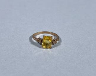 10K GOLD RING | Designed as a 10K gold ring with a faceted yellow stone, size 4.5, marked “10K” total weight; 1.6g 
