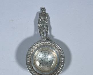 800 SILVER TEA STRAINER | 800 or continental silver tea strainer with knight handle, marked on back “800”, total weight: 2.47 ozt. - h. 1 x w. 3.25 x l. 6.25 in