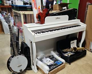 Musical Instruments Including Eastman EAS 650 Rue Saint Georges Alto Saxophone Including Case, Washburn Americana Banjo, Violin Includes Bow, Strings And Case, Zhruns Sound Master Electronic Piano And Small Series Console Mixer