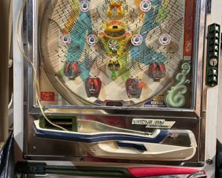 "Vintage Pachinko machines are highly decorative, adorned with colorful graphics, flashing lights, and intricate details. Many feature themes based on popular culture or historical motifs, adding to their visual appeal. In Japan, Pachinko is an immensely popular pastime, with parlors that often resemble bustling casinos. Beyond entertainment, players enjoy Pachinko as a thrilling way to win prizes. These machines bring the excitement of Japanese gaming culture into your home, making them both captivating collectibles and unique decorative pieces.