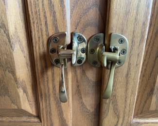 Beautiful White Clad reproduction TV stand in excellent condition, featuring classic ice box-inspired design and quality craftsmanship. This versatile unit combines vintage charm with modern functionality, complete with brass hardware and solid construction. Perfect for adding a touch of nostalgia and character to your living space.