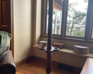 Solid, carved hardwood coat, hat, and umbrella stand with a stunning presence. A true statement piece that combines functionality with timeless elegance.