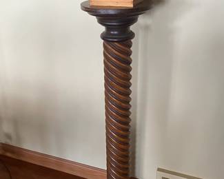 Solid wood and wicker plant stands.