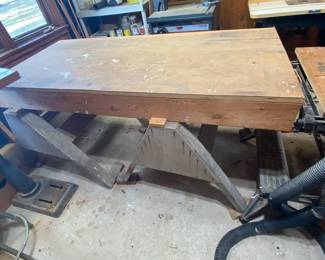 Several workshop benches are for sale, different shapes, functions, and sizes.