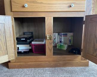 Beautiful White Clad reproduction TV stand in excellent condition, featuring classic ice box-inspired design and quality craftsmanship. This versatile unit combines vintage charm with modern functionality, complete with brass hardware and solid construction. Perfect for adding a touch of nostalgia and character to your living space.