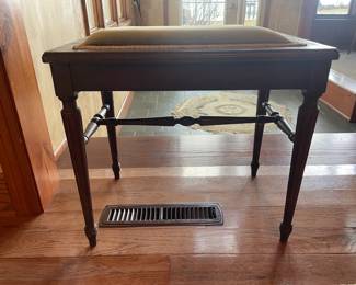 Solid hardwood upholstered piano bench—a rare find with versatile uses beyond the piano. Durable, elegant, and perfect for any space needing a touch of classic charm.