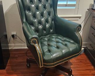 Executive office chair in bottle green leather with nail head trim