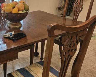Small scale dining table and chairs in kitchen area
