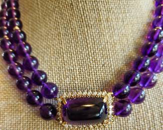 Cushion cut amethyst, diamonds and amethysts beads. 14K