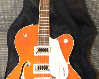 GRETSCH- 6 STRING - ELECTRMAGNETIC ORANGE GUITAR AND CASE.