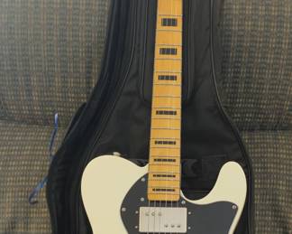 SQUIER BY FENDER - WITH  CASE.