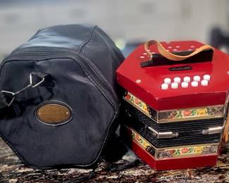 German accordian in case.