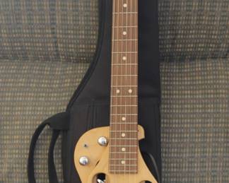 PRO SERIES - 4 STRING ELECTRIC GUITAR -                        
 " THE TRAVELER "  WITH CASE.