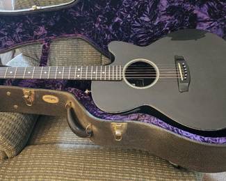 BEAUTIFUL  6 STRING  RAIN SONG ACCOUSTIC GUITAR. COMES WITH THE ORIGINAL LOGO HARD CASE AND LOGO SOFT CASE- ORIGINAL PAPER WORK