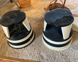 Kramer Step Stool. Spring Casters for moving but goes stationary when stepped on.