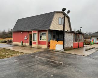 The main building concession at the previous mini golf course and batting cage playground fun center.