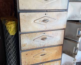 Very functional 5 drawer heavy duty metal cabinet. Could definitely use a coat of paint.
