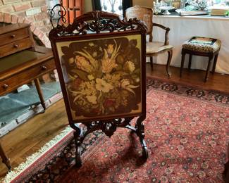 Vintage Victorian needlepoint carved wood fire screen.
