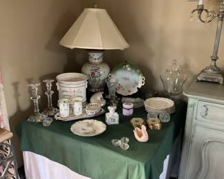 Hand-painted floral ginger jar lamp, Limoges perfume bottle, Orrefors crystal candlesticks, Limoges hand-painted cake plate, Lenox pink swan, crystal salt dips.