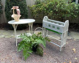 Vintage wicker planter and oval side table.