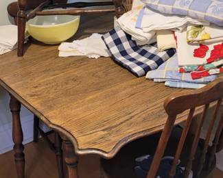 Antique drop leaf table and four chairs
