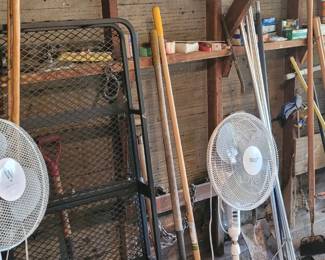 Garden tools wheelbarrow or I should say wheel cart and then also a metal trailer cart