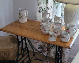 Antique sewing base table a collection of creamer and pictures Lenox lamp