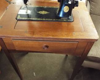 Singer Sewing Machine in Cabinet