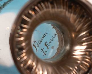 Closeup of Daum Nancy circa 1890s beautifully crafted enameled carved glass open globe on footed metal pedestal, depicting swallows in flight at sunrise against a graduated blue sky. Signed Daum Nancy and with the cross of Lorraine.