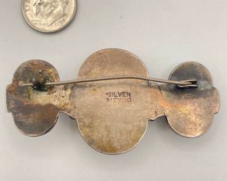 Reverse view of Taxco Mexico silver brooch with three differently colored hard stones or glass; gifted to original owner in 1957
