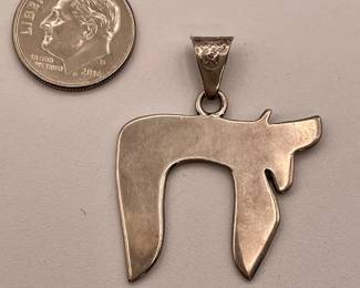 Reverse of pendant, sterling silver with turquoise colored inlay