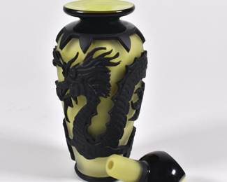 Another view of Barry Sautner signed art glass cameo glass stoppered yellow bottle with black dragon design, numbered 00014