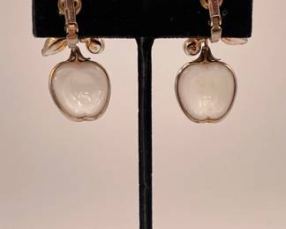 Reverse view of Crown Trifari apple pendant earrings, white milk glass, gold tone metal